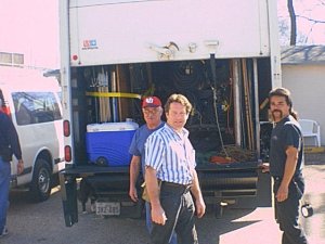 Crew prepare to unload truck.